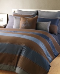 Ever luxurious in satin jacquard stripe, the Saville Row comforter set from Sean John makes a sophisticated statement in tones of chocolate, sky and ocean blue. Embellished with ribbing details; reverses to solid.