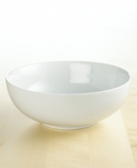 Timeless, elegant and durable, this vegetable bowl (shown back) features a silky smooth white body and shiny clear glaze. A great choice for both everyday and formal gatherings.