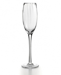 Simply beautiful hand-blown Optic champagne flutes from Artland's collection of drinking glasses feature clear stems and gently faceted bowls for a dreamy, twinkling effect. This set of toasting flutes has dishwasher-safe glass for effortless elegance.