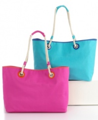 Life's a beach! Fit everything you need for a fun day at the beach in this stylish canvas beach tote from Martha Stewart Collection. Comes in bright colors and features a fun print on the inside.