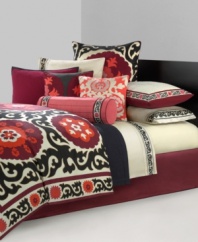 Evoking a traditional look with a modern touch, this Samarkand comforter set from N Natori takes inspiration from the ancient Eastern city of the same name. This Asian-themed set boasts an abstract floral and flourish motif in rich reds and oranges for a statement-making look in the bedroom.