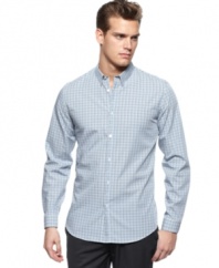 Style check.  Keep up with the current look of buttoned-down cool with this checked shirt from Calvin Klein.