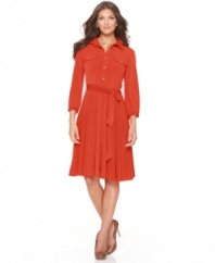 A shirtdress with swing, from NY Collection. The fluid drape and flared silhouette enhances any figure!