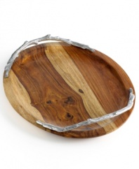 Out of the woods. Crafted in beautiful sheesham hardwood, this Martha Stewart Collection serving tray is a natural choice for casual entertaining. Carved aluminum handles elevate its simple silhouette with cool sophistication.