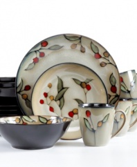 Stylized florals with the look of stained glass contrast solid black in the Dolce dinnerware set from Sango. Coupe shapes make place settings for four at home on casual, modern tables.