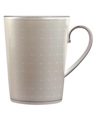 Wake up to fresh, luminous style with this fine china mug. From innovative designer Monique Lhullier's collection of dinnerware and dishes, it features a pearlescent border with glossy raised dots and a fine stitch-like pattern.