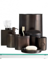New material for the bath. Made of pure metal to outsmart slippery hands and hard floors, the Executive Oil Bronze tumbler gives your space a cool, modern vibe.