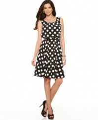 Distressed, printed circles create anything but your ordinary polka-dot! Gorgeously shaped in an A-line silhouette, this dress was made for both work and play.