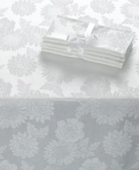 Ready for anything. With a tablecloth and napkins for up to eight guests, this Dinner Party Medley table linens set offers efficiency for the busy host and a classic white floral motif to make any meal elegant.