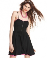 Material Girl pumps edge into the little black dress via hot pink trims and a bustier-style top! Style the frock with color fun accessories that electrify your day look!