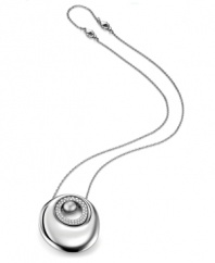 Shape, shine, and endless design possibilities combine in this unique Breil necklace. Crafted from stainless steel and featuring a ring of sparkling Swarovski crystals, this necklace can be worn three different ways. Remove the outer large pendant for a sparkling look, wear all three pendants to make a statement, or showcase one single bead for subtlety. Approximate length: 16-1/2 inches + 2-inch extender. Approximate drop: 2 inches.