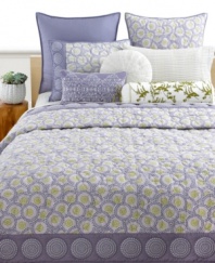 Sumptuous quilting with detailed circle embroidery lends a warm accent to the Sakura bedding from Style&co. A reverse solid purple design enhances the collection with soothing color.