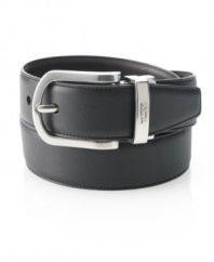 Harness that sleek effortless polish with this classic finishing touch - a smooth leather belt - from Tumi.