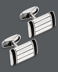 A dapper accent for any occasion: from office attire to black tie affairs. These sleek cuff links feature a rectangular shape, sterling silver setting and black onyx accents. Approximate length: 9/10 inch. Approximate width: 1/2 inch.