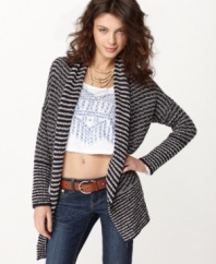 Add some nautical flair to your look with this striped cardigan from Free People. Pair it over a cropped tee and skinny jeans for a trend-forward look.
