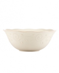 With fanciful beading and a feminine edge, this serving bowl from the Lenox French Perle white dinnerware collection has an irresistibly old-fashioned sensibility. Hard-wearing stoneware is dishwasher safe and, in a soft white hue with antiqued trim, a graceful addition to every meal. Qualifies for Rebate