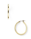 Simple and chic, Lauren by Ralph Lauren's gleaming hoop earrings bring classic style to your look.
