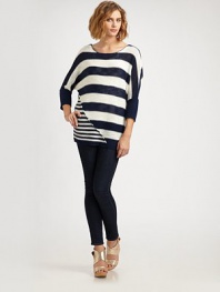 Boldly striped boatneck with long dolman sleeves, ribbed details and deconstructed, asymmetrical seaming. BoatneckLong dolman sleevesRibbed cuffs and hemLonger length hits below the hips58% linen/31% acrylic/11% nylonDry cleanImportedModel shown is 5'9½ (176cm) wearing US size 4.