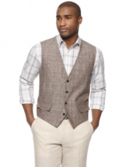 Get invested in your style with this sophisticated plaid vest from Tasso Elba.