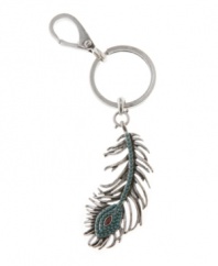Proud as a peacock. Take pride in staying perfectly organized with Lucky Brand's peacock feather key chain. Made in plastic and set in silver tone mixed metal. Approximate length: 5-1/10 inches.
