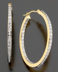 Dazzling diamond accents line these brilliant hoop earrings inside and out. Crafted in 14k gold. Approximate diameter: 1 inch.