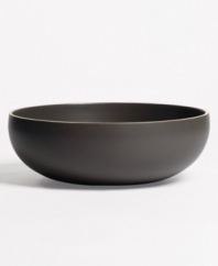 With a powdery matte finish and clean modern shapes, this dinnerware collection from renowned designer Vera Wang brings minimalism to the table with chic style. In soft, natural graphite, this serving bowl coordinates perfectly with any decor.
