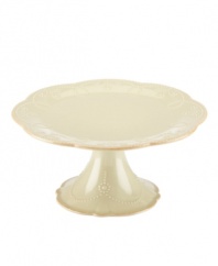 With fanciful beading and a feminine shape, this Lenox French Perle cake stand has an irresistibly old-fashioned sensibility. Hardwearing stoneware is dishwasher safe and, in a soft pistachio hue with antiqued trim, a graceful addition to dessert. Qualifies for Rebate