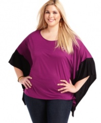 Showcase dramatic style with Soprano's batwing sleeve plus size top, featuring an on-trend colorblocked design-- it's a perfect match with jeans!