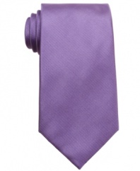 Switch hit. This solid tie from Perry Ellis looks great atop a patterned dress shirt.