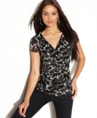 This petite top by INC features a sketch-like floral print and a fitted silhouette that makes for an alluring evening-out ensemble with skinny dark denim (and your highest heels, of course!).
