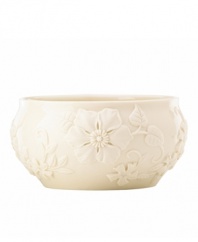 Teeming with fresh blooms in graceful ivory porcelain, the Floral Fields bowl from Lenox has a serene, understated elegance. A simple silhouette balances elaborate sculpted detail. Qualifies for Rebate