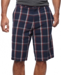A big bold plaid print enlivens your summer style with these shorts from master of leisure Tommy Bahama.
