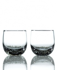 Speckled with black for a stylish twist, Jet tumblers are an eye-catching addition to contemporary tables. This set of cool, easy-care drinking glasses is a perfect match for Denby's equally alluring Jet dinnerware collection.