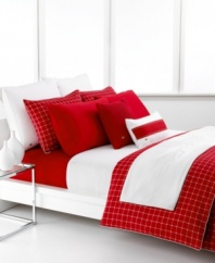 In a spicy palette of white and red, this Denab duvet cover set from Lacoste features a simple windowpane plaid print for a decidedly bold statement in the bedroom. Button closure.