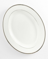 Bright fine china is simply adorned with a band of platinum for an unforgettably elegant table. The Cameo Platinum design from Mikasa's dinnerware and dishes collection is perfect for formal dinners, teas, and luncheons. This platter's wide rim and flowing lines add a graceful touch to your table.