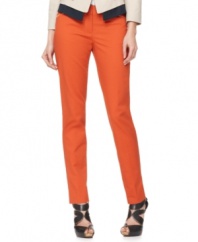 Add T Tahari's pants to your wardrobe rotation this season--their sleek, streamlined style and bold hue make them super stylish while zippered front pockets add a dash of edge.