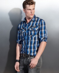 A western-inspired plaid pattern adds a rugged feel to a city-ready shirt by INC.