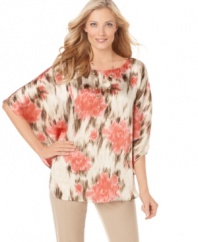 Go floral in this chic top from J Jones New York, featuring a blousy fit and flattering batwing sleeves! Pair it with skinny pants and flats to complete the look.