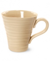 From celebrated chef and writer, Sophie Conran, comes incredibly durable dinnerware for every step of the meal, from oven to table. A ribbed texture gives this mug the charming look of traditional hand thrown pottery. Shown in white.