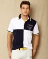 Captain your casual style with this nautical-inspired polo from Nautica.