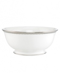 Inspired by the trim on an elegant gown, the graceful Lace Couture serving bowl features an intricate platinum border that combines harmoniously with white bone china for unparalleled style. By Lenox. Qualifies for Rebate