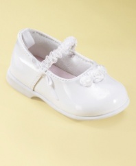 Pretty rosettes make these comfy little First Impressions shoes exceptionally cute.