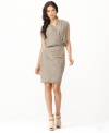 Accordion pleats and a paneled style create a sophisticated look on this pretty party dress from RACHEL Rachel Roy.