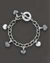 A chunky chain bracelet and studded heart charms give Lagos' sterling silver bracelet a hip appeal. Designed by Lagos.