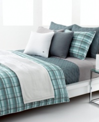 The Odum comforter set from Lacoste features an effortless plaid pattern in a mixture of moss green and smoky blue over ultra-comfortable cotton. Subtle lines of light rust run through the casual look, offering a coordinate with textured Lacoste bedding accents.
