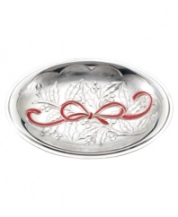 All tied up in a pretty red bow, this tray from Lenox's serveware and serving dishes collection is a gift to holiday tables. A lavish holly motif crafted in radiant aluminum provides a festive backdrop for fresh-baked rolls, muffins and more. Qualifies for Rebate