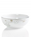 Wildflowers take off on glazed white porcelain, sparkling as they tumble aimlessly around the Platinum Silhouette cereal bowl from Charter Club dinnerware. The dishes have a banded edge that adds a classic touch to a pattern with modern spirit.