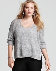 This Eileen Fisher boxy sweater takes a classic relaxed silhouette and updates it in a marled linen knit with thick ribbing at the hem.