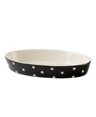 Make no stops from the oven to the table with this elegant oval dish. Adorned with a classic hand-painted dot pattern on a fun range of mix and match colors.