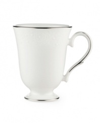 Beautiful and bridal-inspired, this classic white mug is richly textured with a delicate floral motif and raised, beaded accents. Finished with a band of polished platinum. Qualifies for Rebate